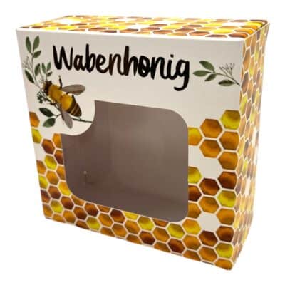 Honigwabe im Bienenkasten mit Biene.